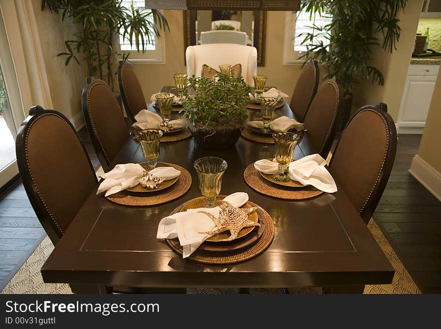 Dining table with modern tableware. Dining table with modern tableware.