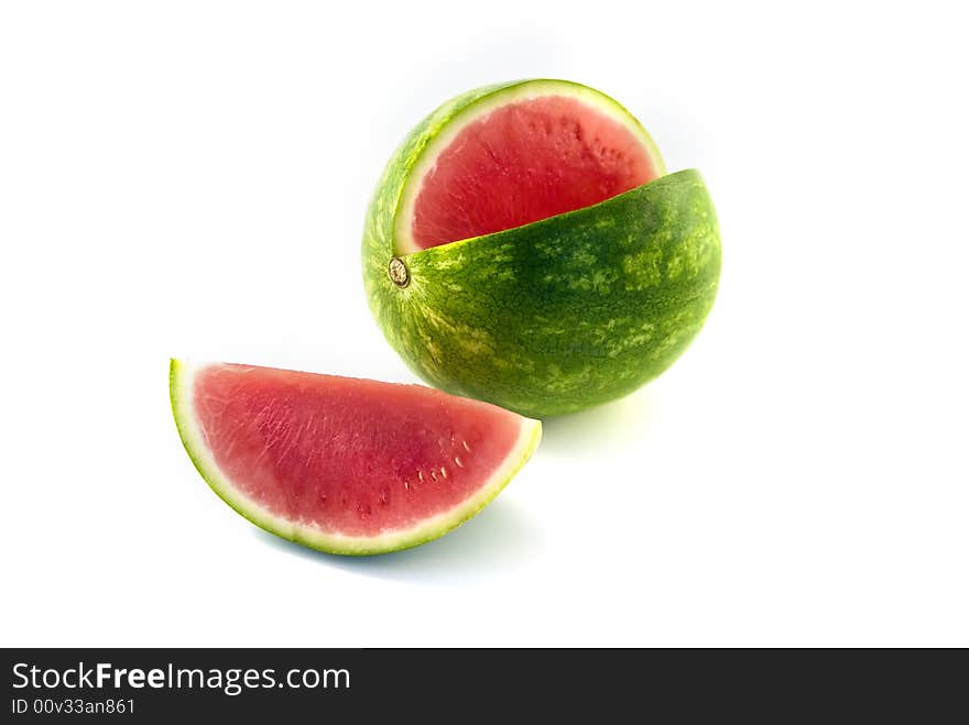 Watermelon and slice isolated on white