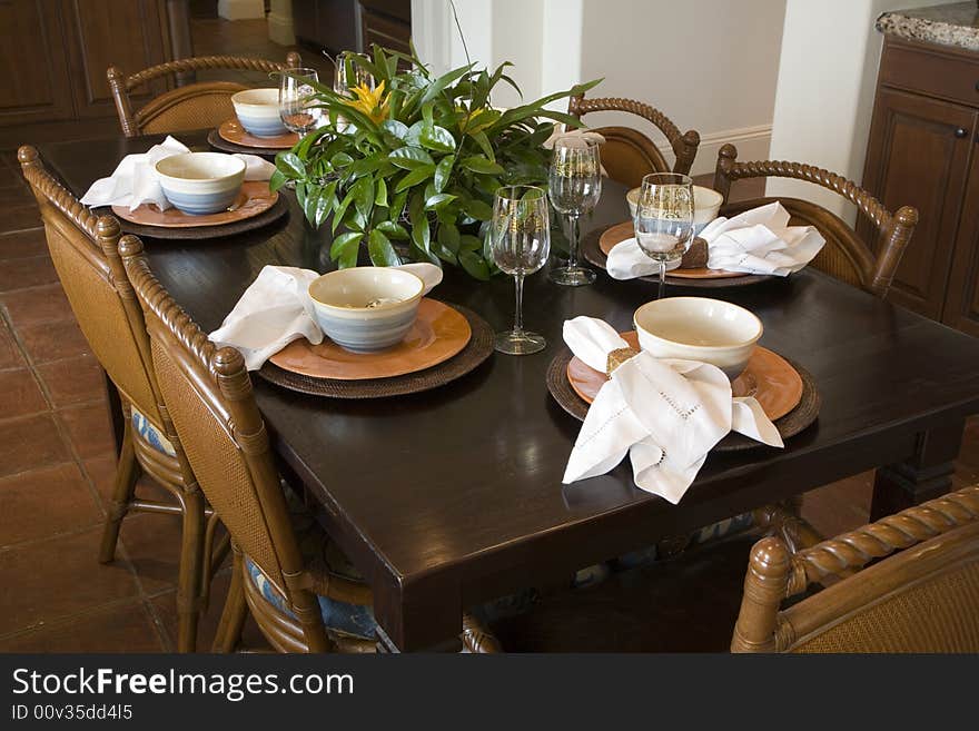 Dining table with modern tableware. Dining table with modern tableware.