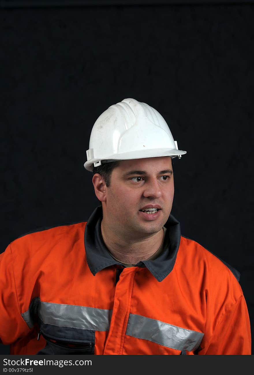 Portrait of a mine worker with helmet