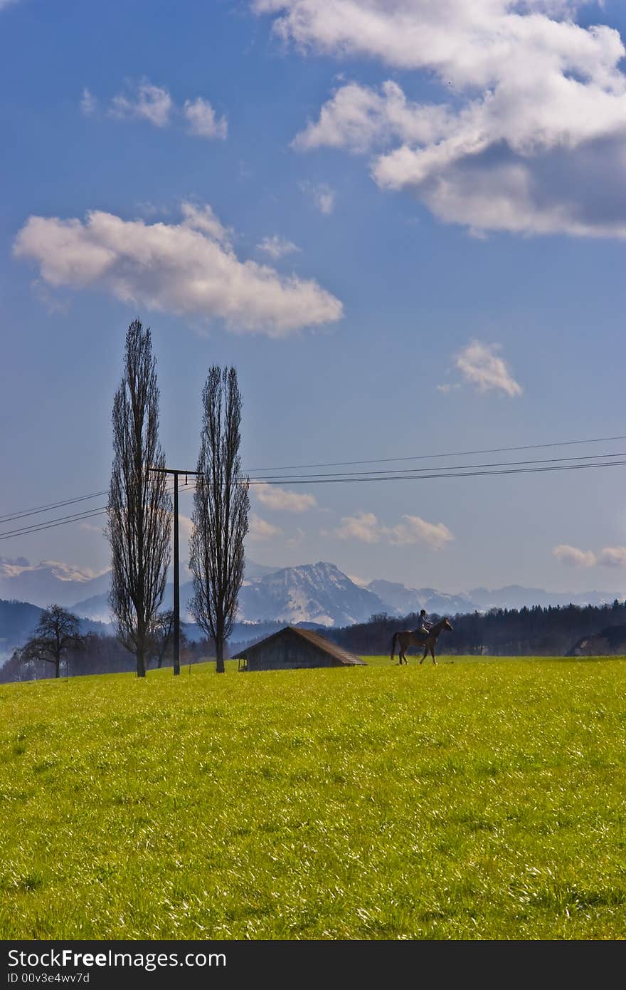 Horse riding in the swiss countryside