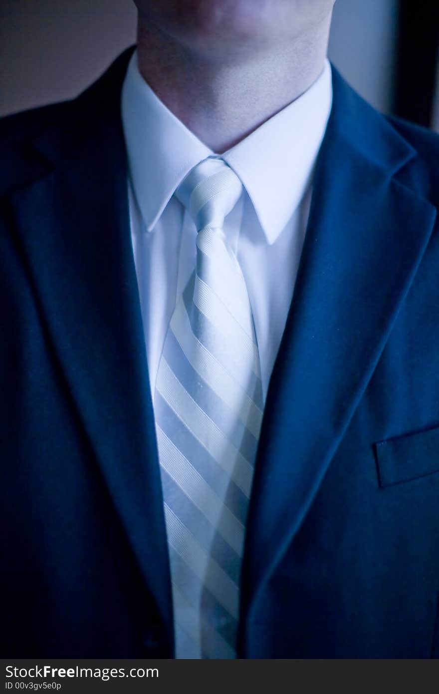 Business suit with white tie