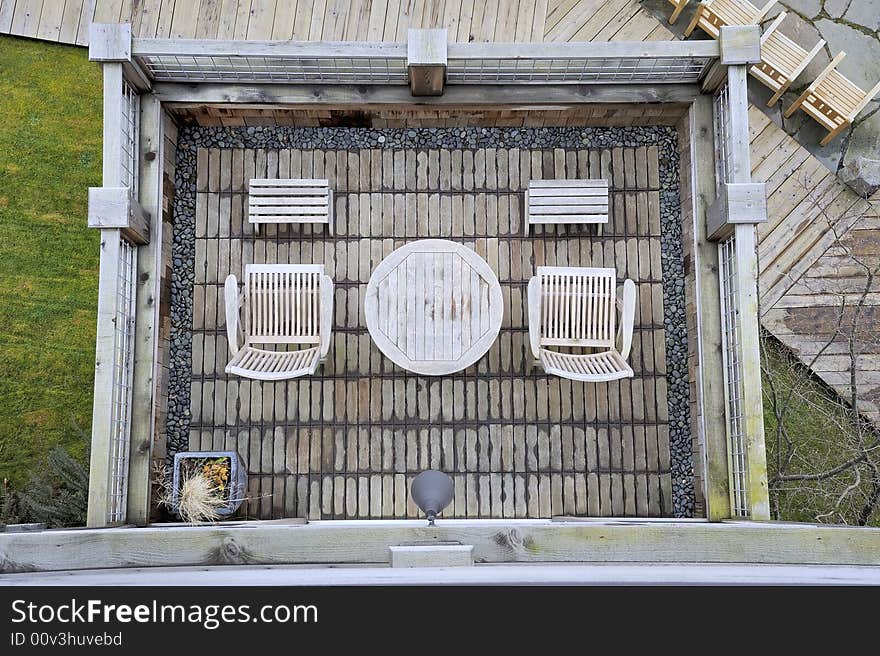 View of a Zen-like weathered cedar deck below at a luxury inn on Whidbey Island, Washington, USA. View of a Zen-like weathered cedar deck below at a luxury inn on Whidbey Island, Washington, USA.