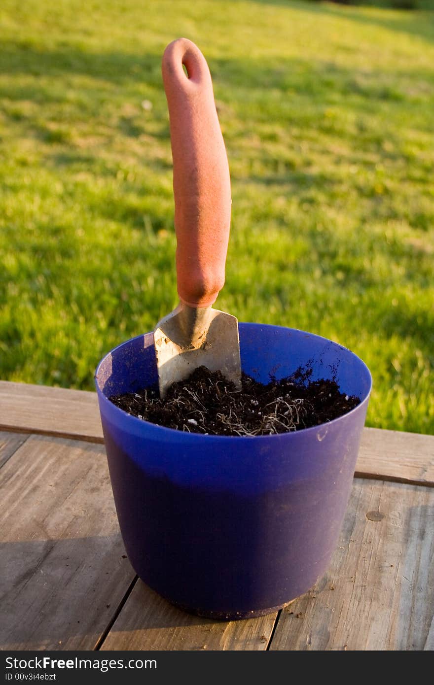 Trowel In A Planting Pot