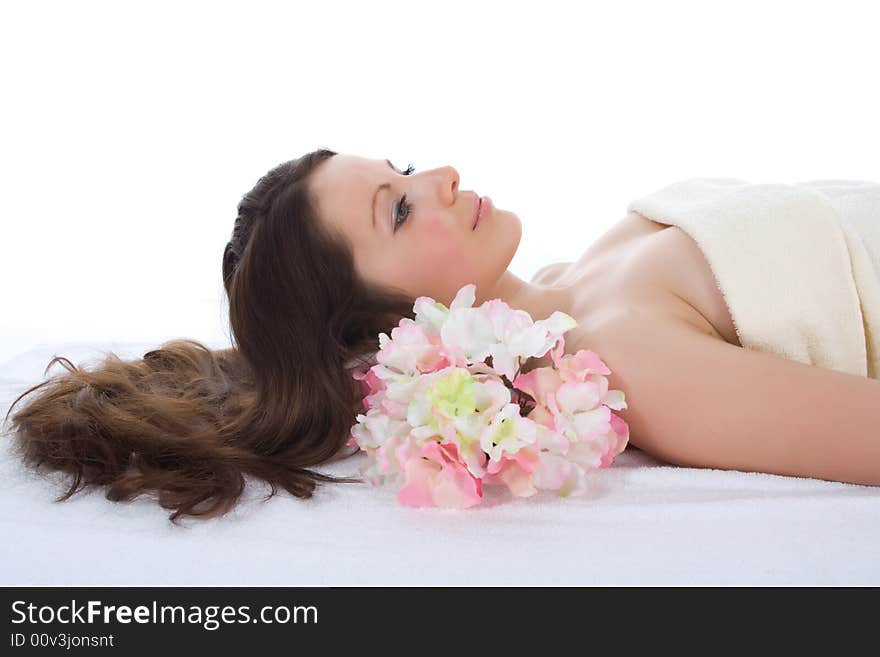 Attractive woman getting spa treatment on white