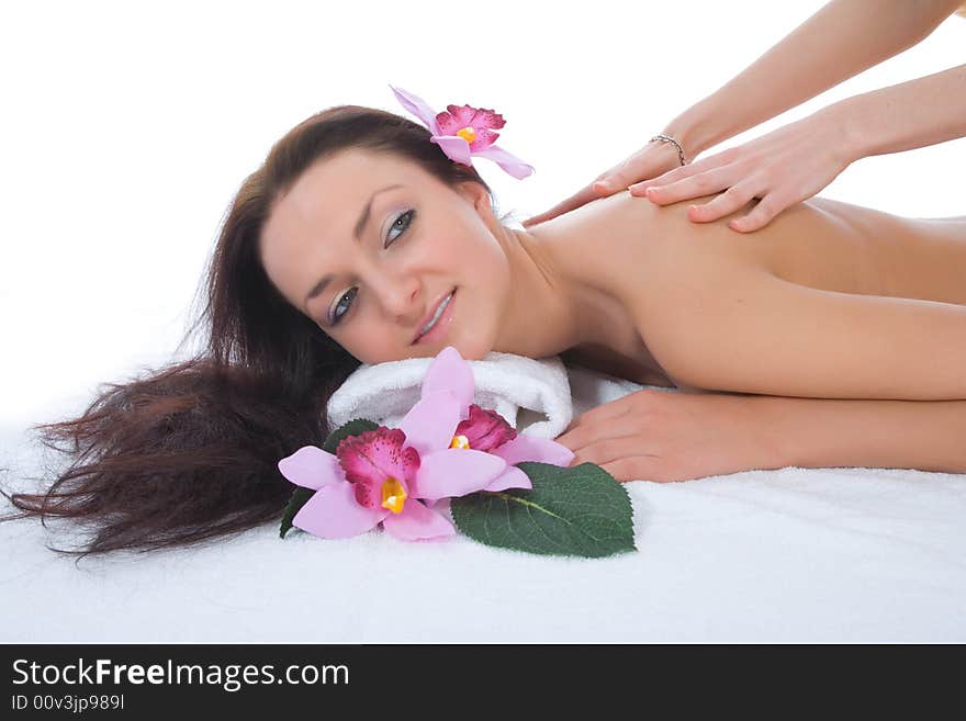 Attractive woman getting spa treatment on white