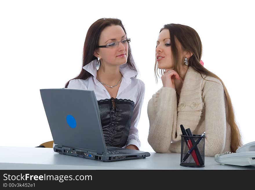 Two business woman work with laptop