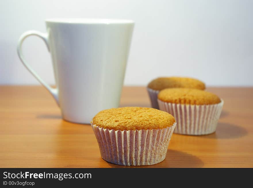 Cakes and the cup of tea with the lemon. Cakes and the cup of tea with the lemon