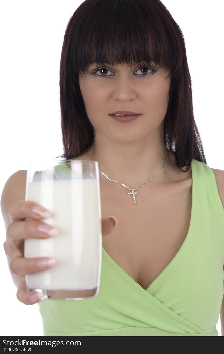 Woman with a glass of milk against a white background