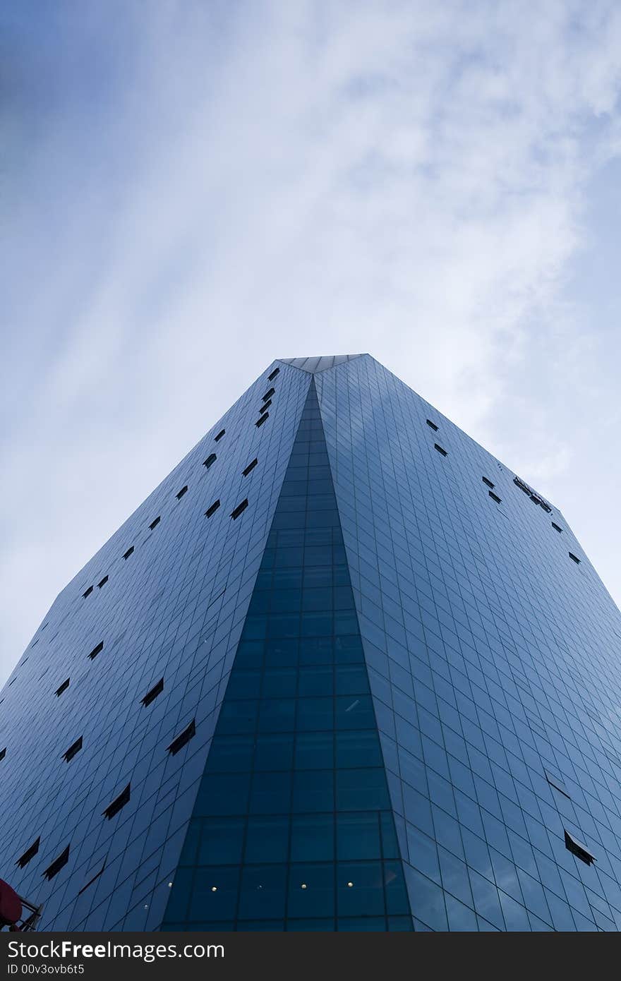 An office building with glass facade.