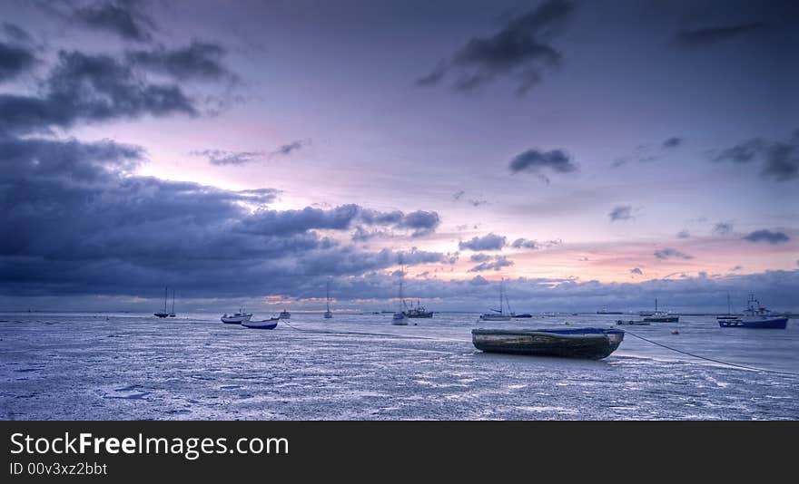 Sunrise and muddy beach