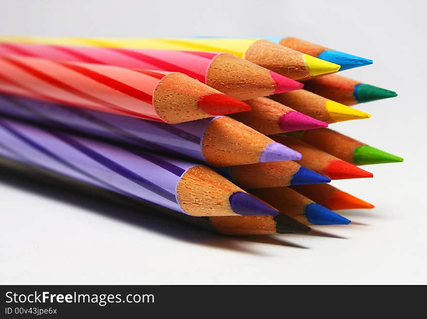 A set of color pencils with white background.