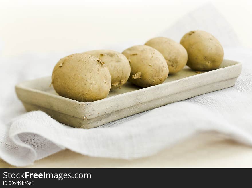 Five raw potatoes