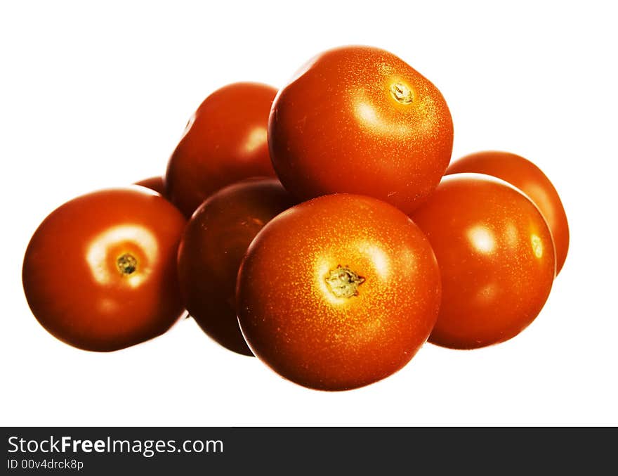 Tomatoes on white. See my other images of tomatos.