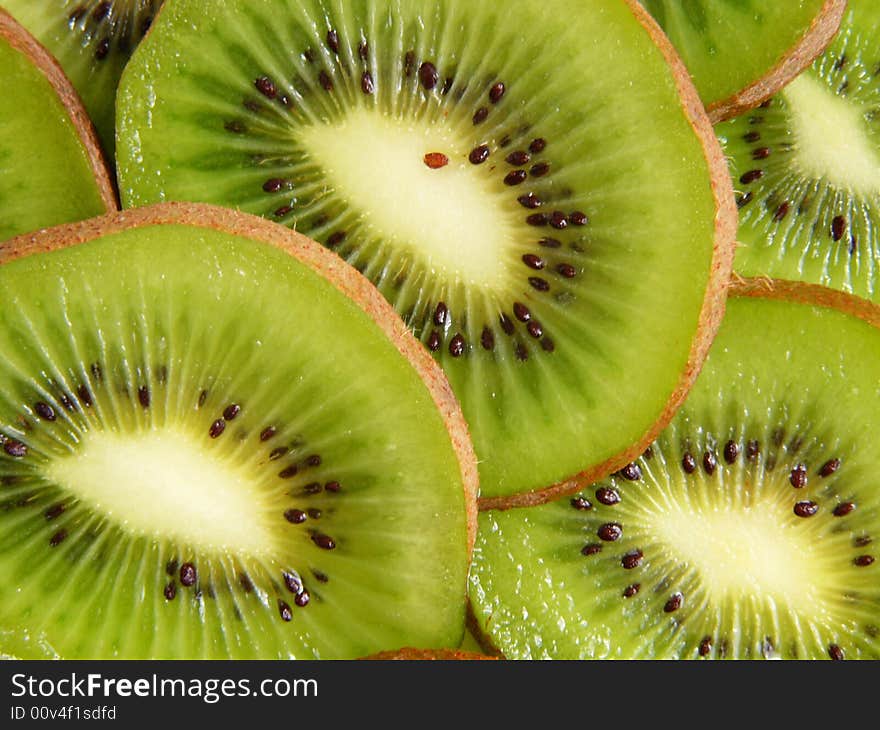 Kiwi slices on white background. Kiwi slices on white background