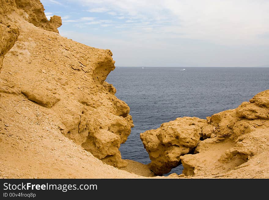 Mountain on a background of the sea. Mountain on a background of the sea