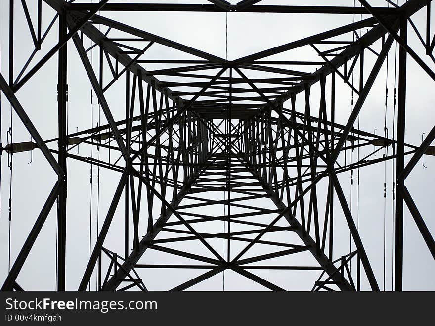 A view looking up into the height of a powerful pylon. A view looking up into the height of a powerful pylon