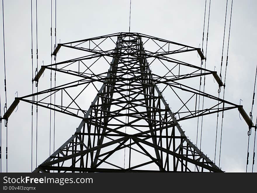 A view looking up at the height of a powerful pylon. A view looking up at the height of a powerful pylon