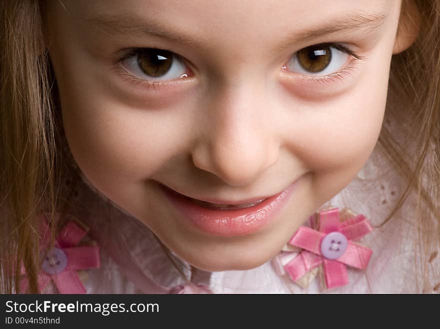 Close-up portrait of cute little girl