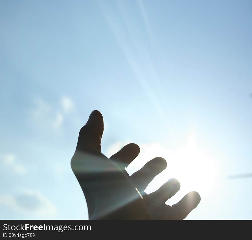 Womans hand on sky backround. Womans hand on sky backround