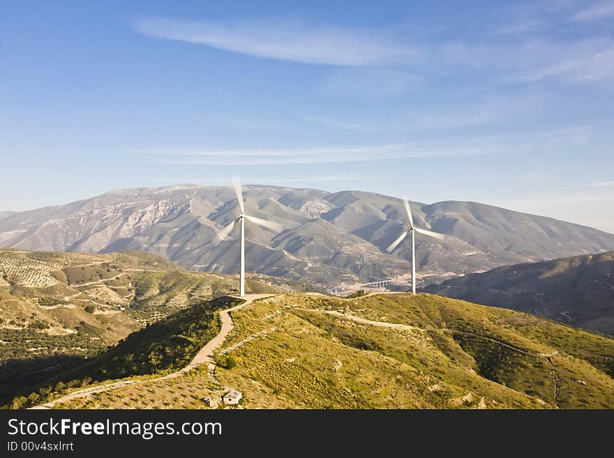 High tech power generators in Mediterranean landscape. High tech power generators in Mediterranean landscape