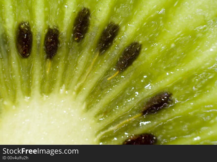 Macro shot of vivid green kiwi