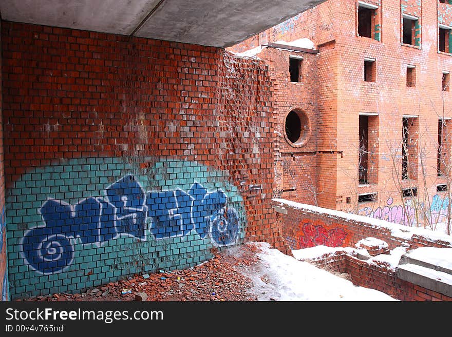 Graffiti ruined urban building winter blasted. Graffiti ruined urban building winter blasted