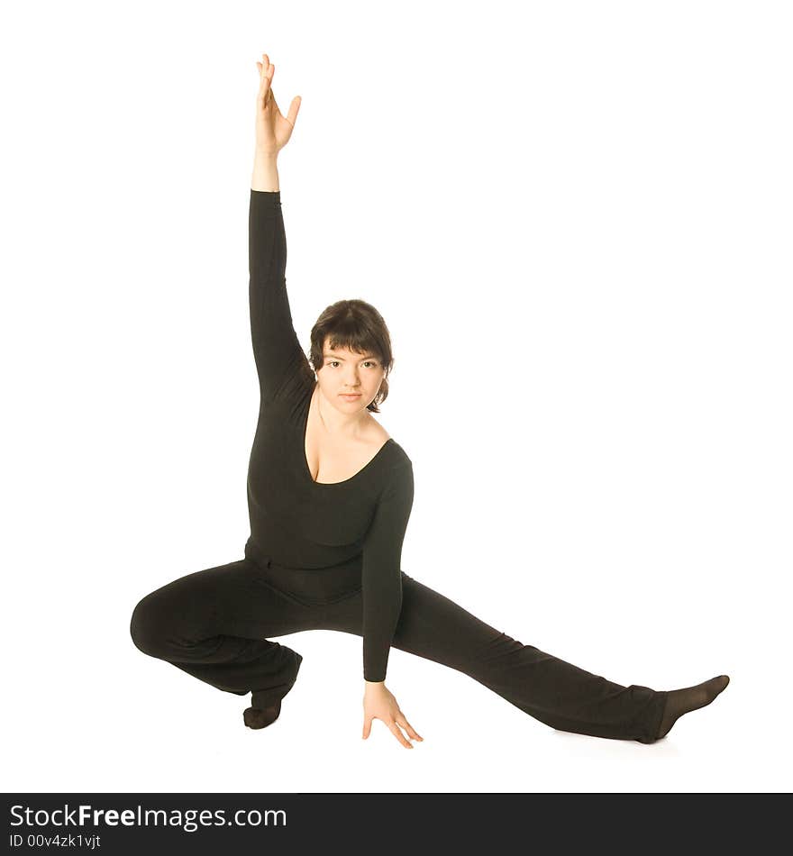 A young woman dancing jazz-modern in a scenical pose. A young woman dancing jazz-modern in a scenical pose