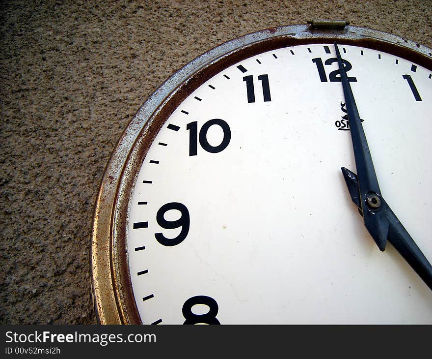 Old rusty clock on the wall. Old rusty clock on the wall