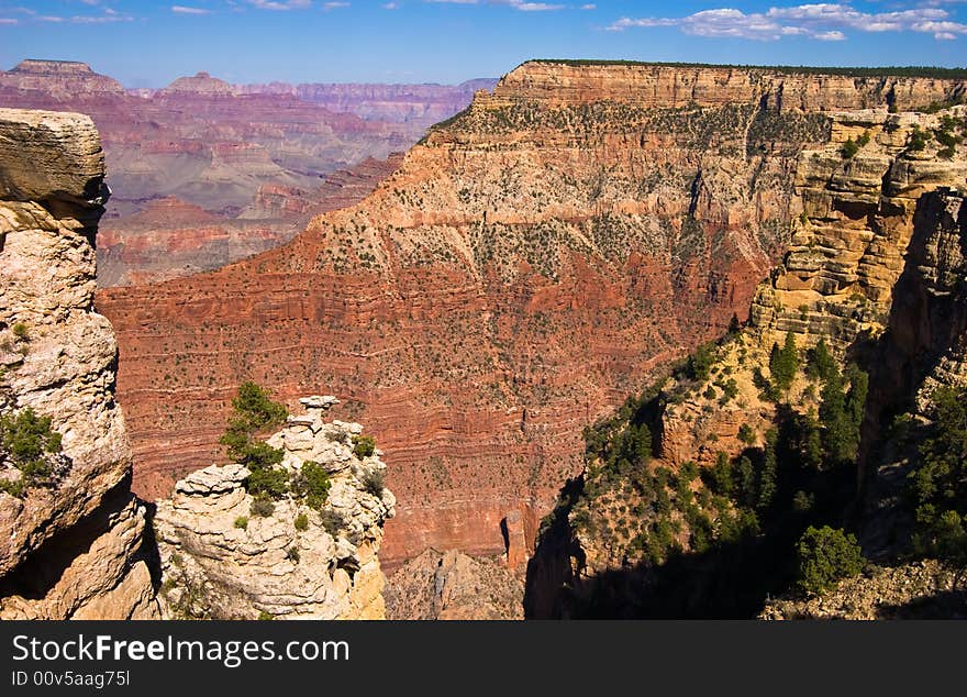 Overview of a Grand Canyon valley framed by rocks