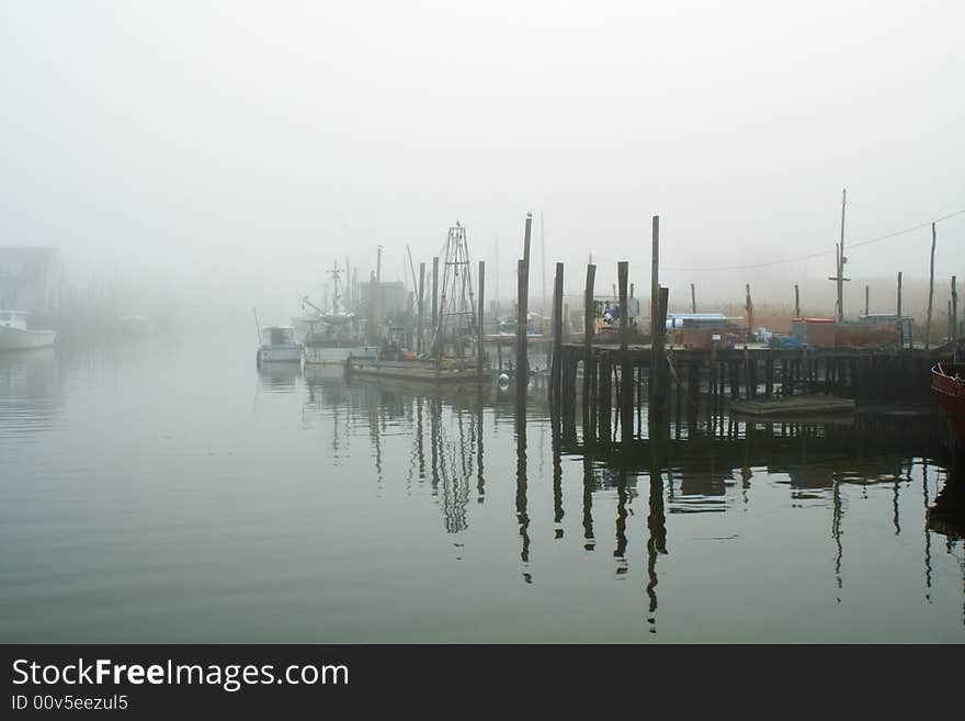 Harbor in early morning fog. Harbor in early morning fog