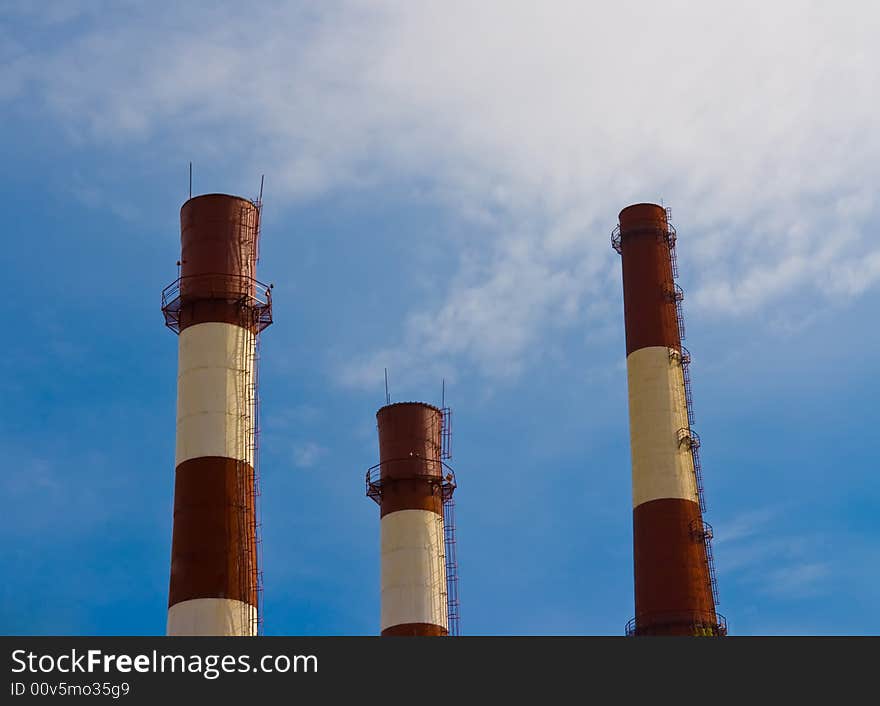 Three plant pipe at the blue sky background