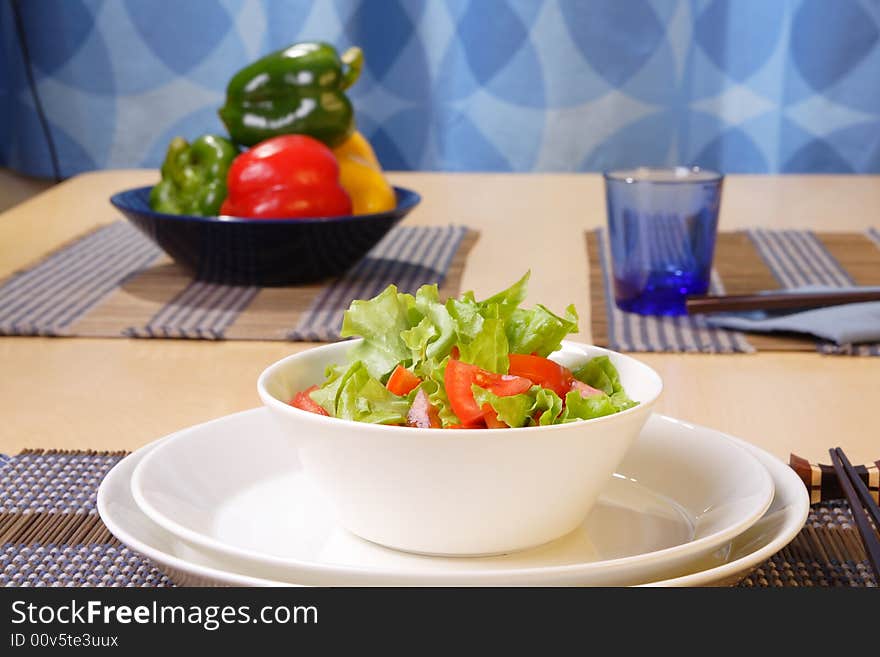 Table with salad bowls