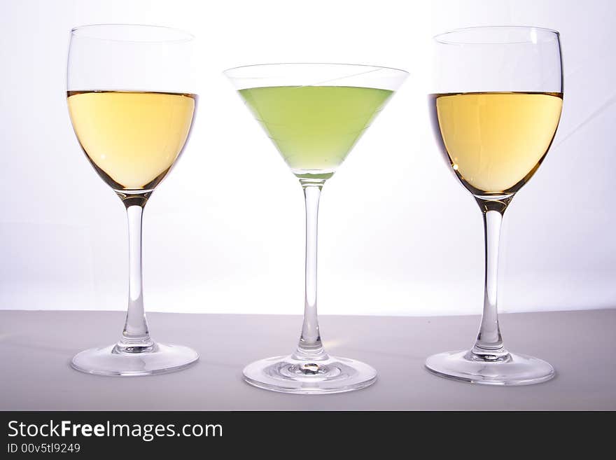 Wine and martini glasses in studio light. Wine and martini glasses in studio light