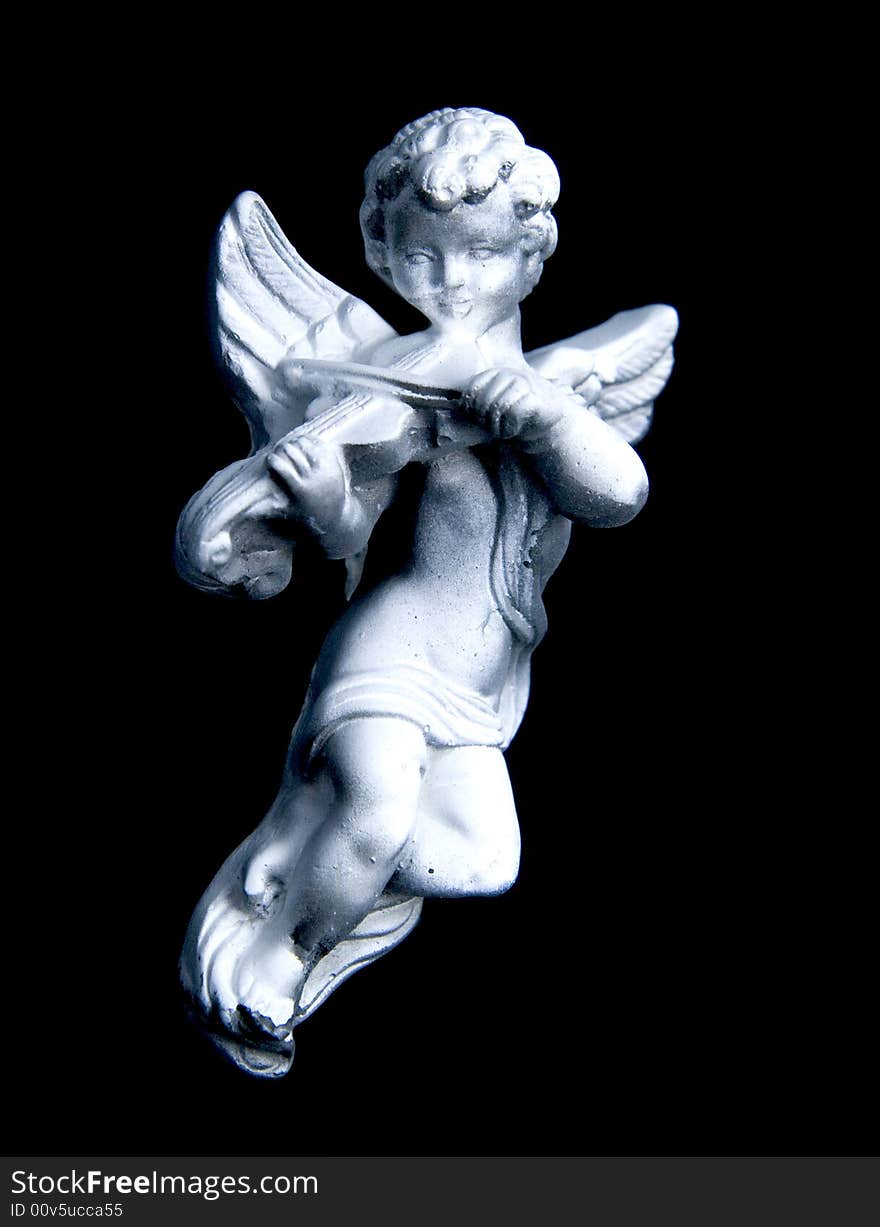 Statue of a harp playing cherub. Statue of a harp playing cherub