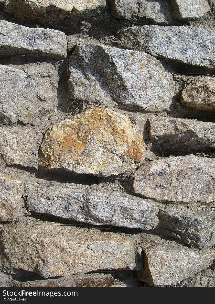 Wall from the stones fastened by cement