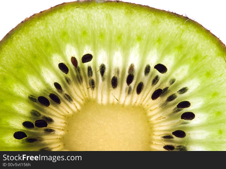 Sliced kiwi close up. Isolated on a white background. Sliced kiwi close up. Isolated on a white background.