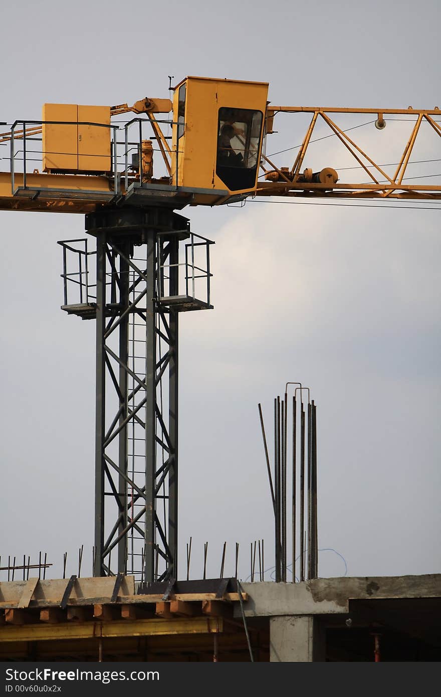 Building yellow crane in the sky. Building yellow crane in the sky