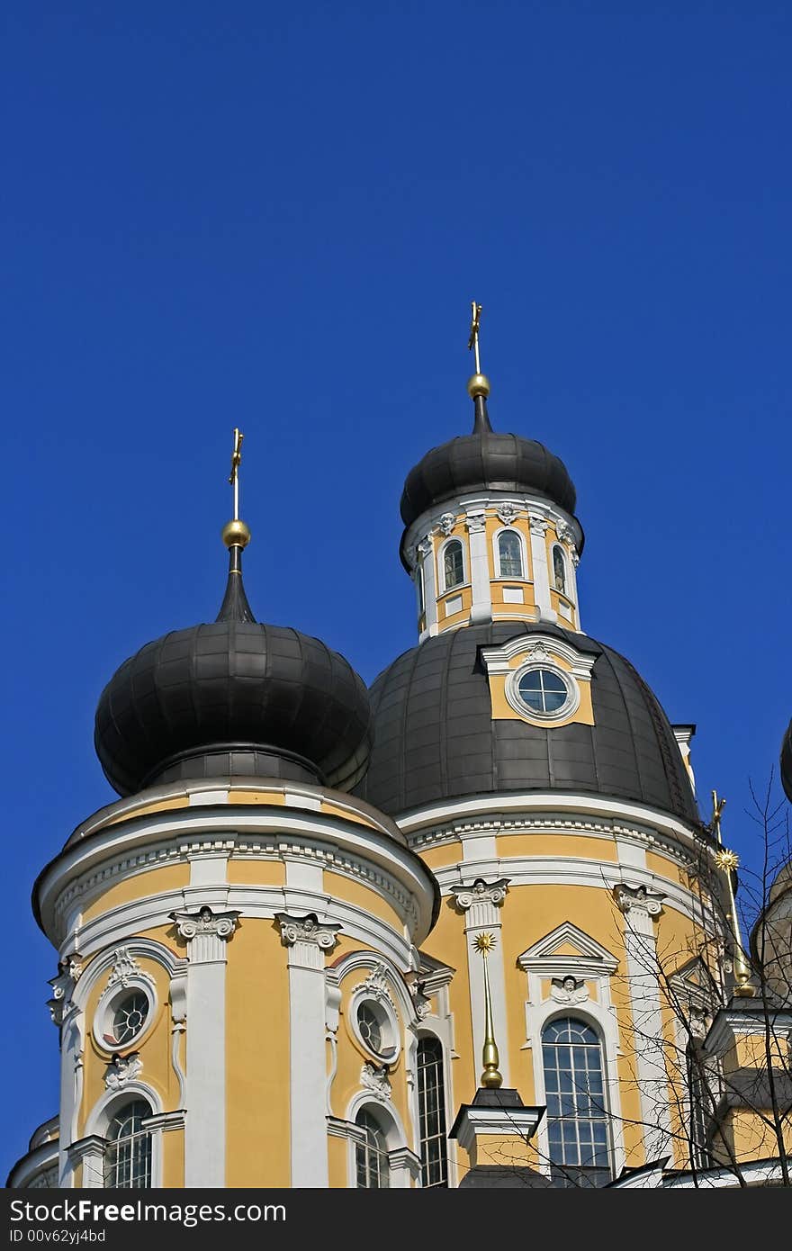 Domes of orthodox church on a blue sky background. St.Petersburg, Russia