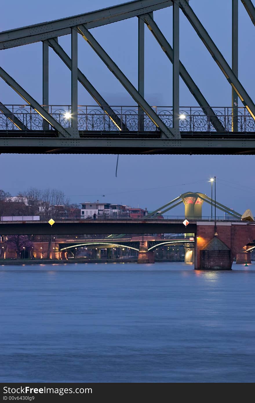 Historical pedestrial bridge on the river Main in Frankfurt at night. Historical pedestrial bridge on the river Main in Frankfurt at night.