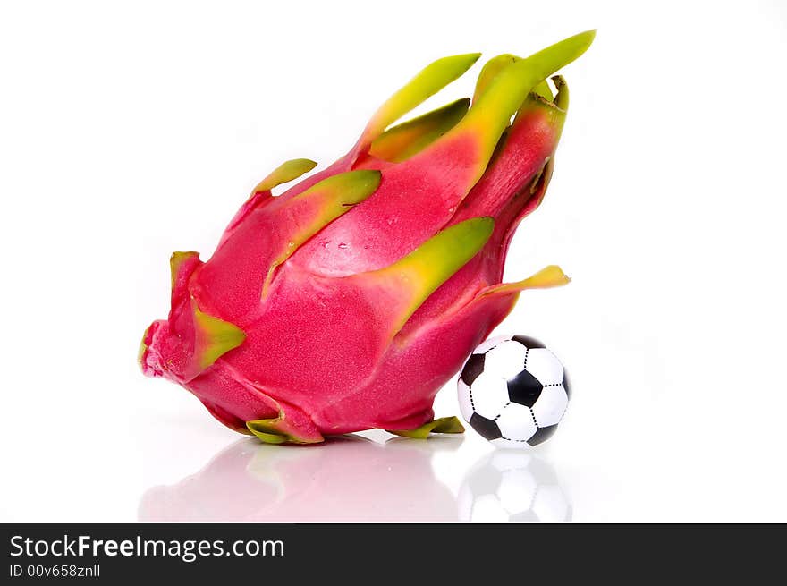 Pitahayal fruit and soccer ball isolated on white. Pitahayal fruit and soccer ball isolated on white