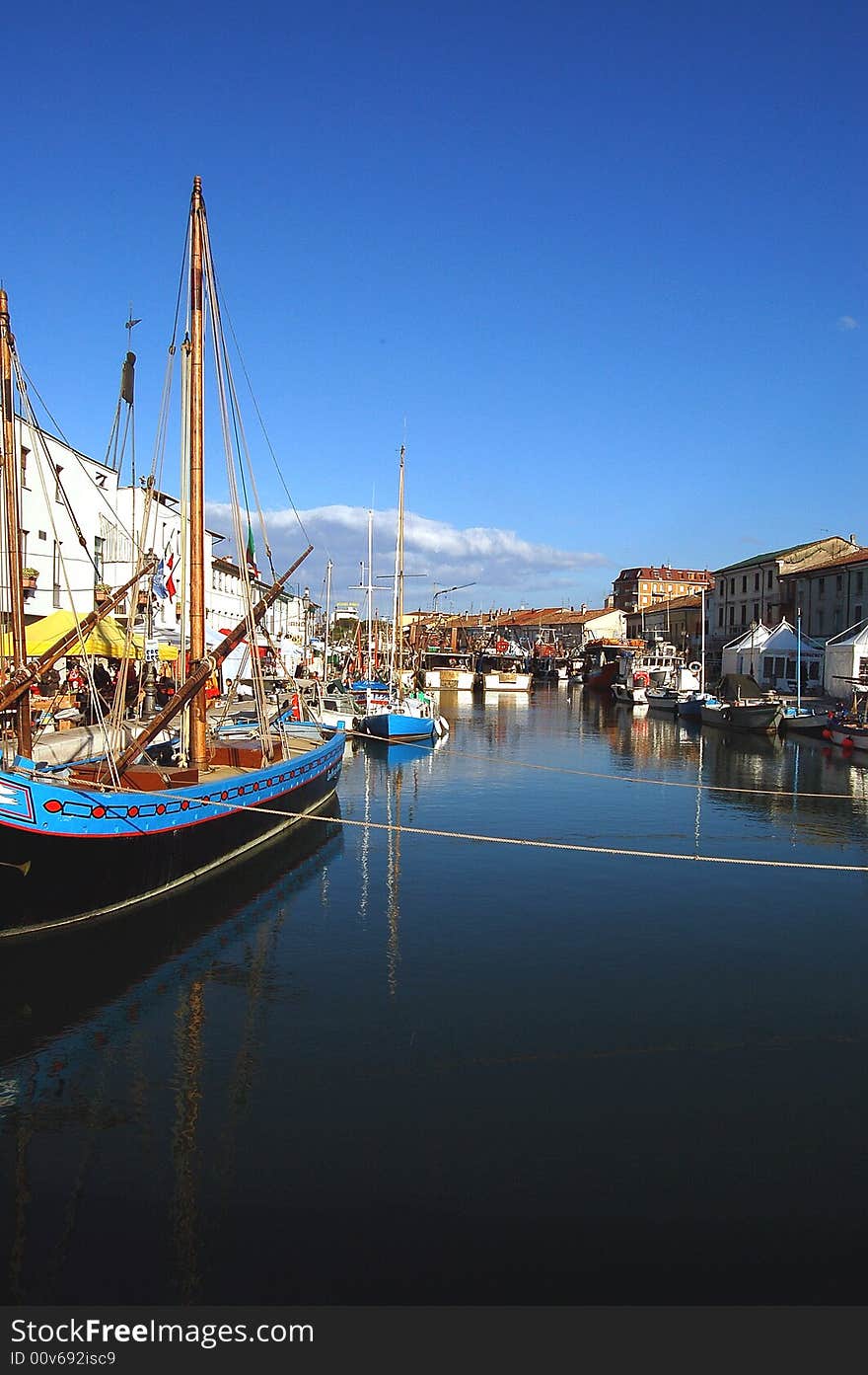 A channel of seaport with historian boat , the boat is antique   sailing boat. A channel of seaport with historian boat , the boat is antique   sailing boat