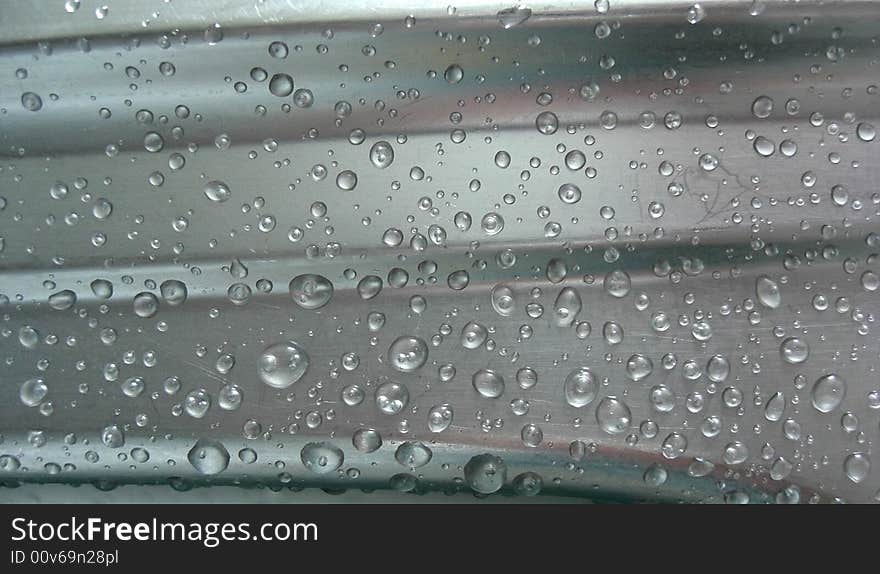 Water drops on gray metall. Water drops on gray metall.