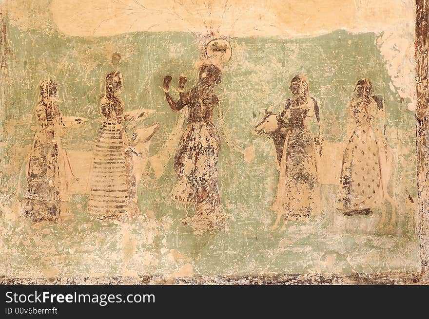 India, Jaipur: fresco on a wall; sandy colors  for this wall decoration with women in traditional dress. India, Jaipur: fresco on a wall; sandy colors  for this wall decoration with women in traditional dress