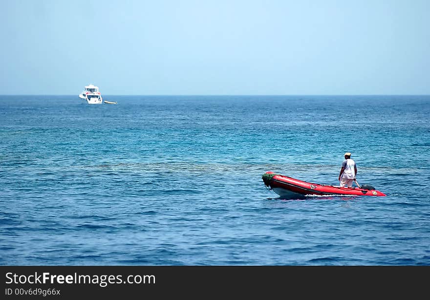 Boat on deep blue the sea. Boat on deep blue the sea