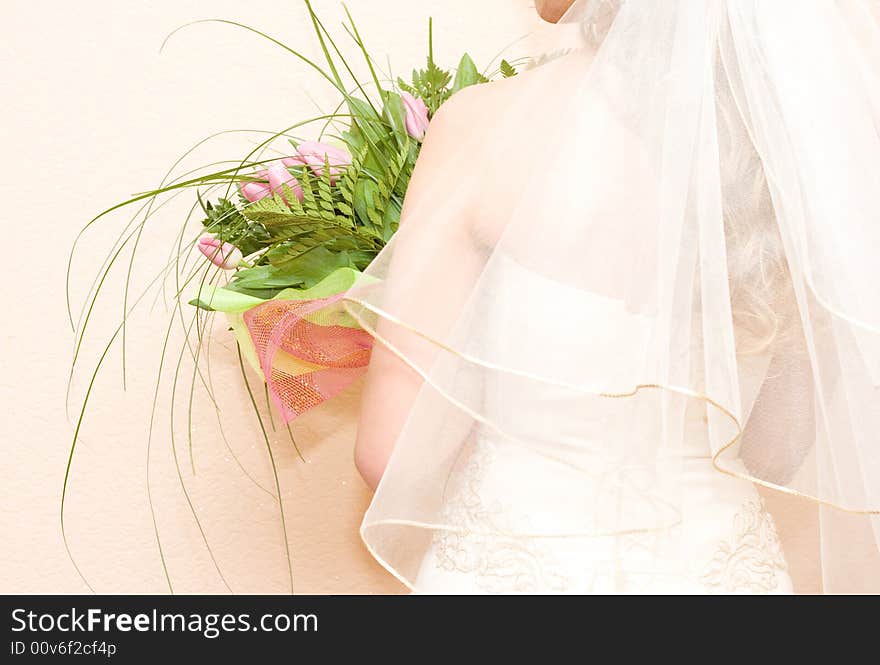 Bride with bunch of tulips