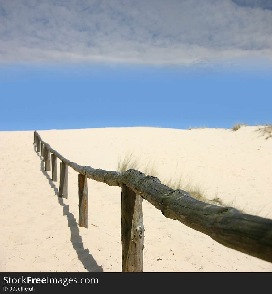 Handrail in the beach with blue sky. Handrail in the beach with blue sky