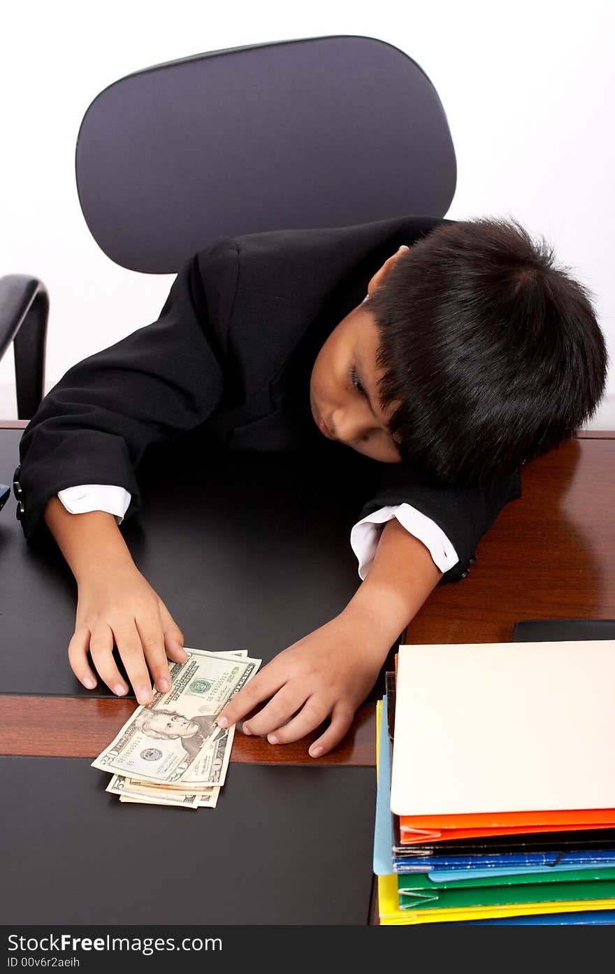 Young executive man getting tired counting money