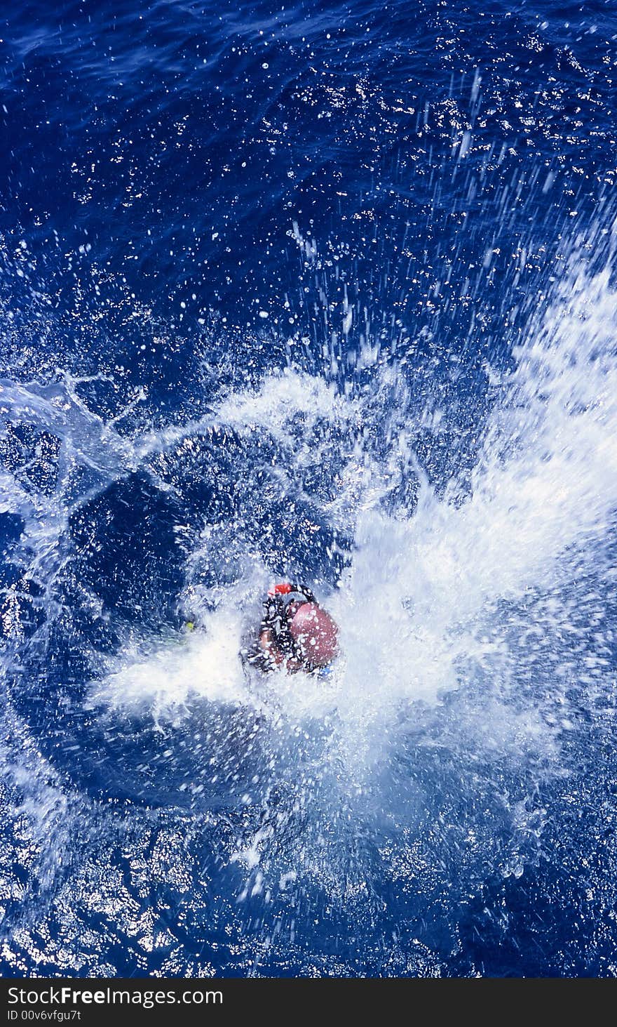 Diver is jumping into the water