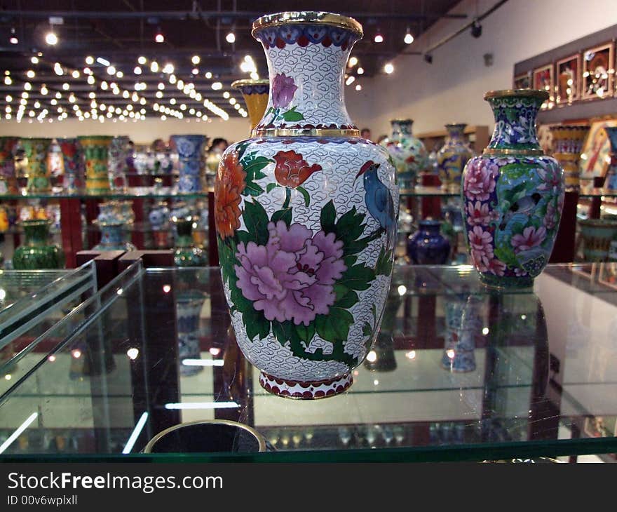 A chinese vase on display in a shop